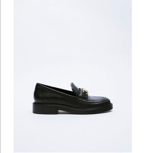 Medal buckle leather loafers from Zara